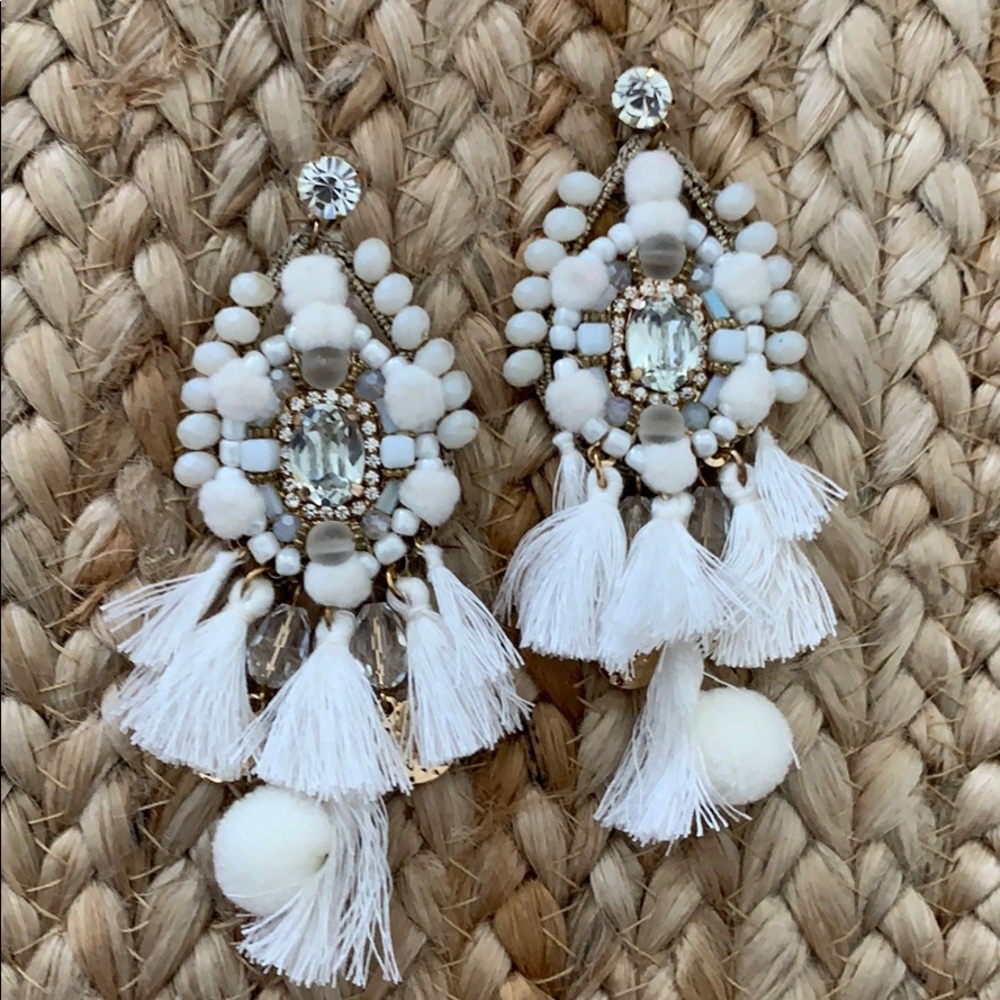 White statement earrings